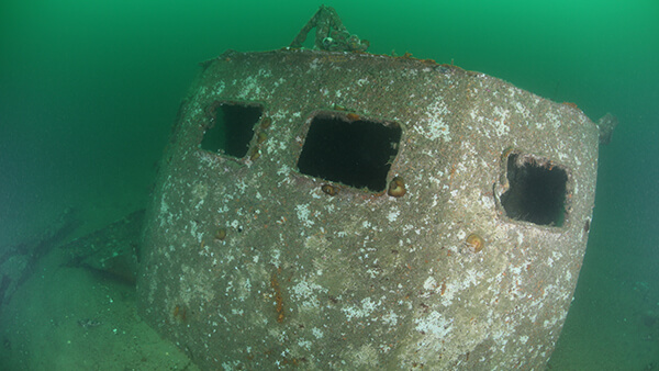 part of a shipwreck with many windows