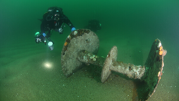 equipment from a ship rests on the seafloor