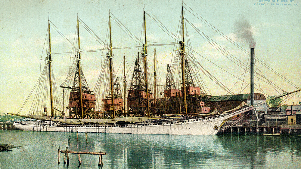 A bpainting of a large white ship with 5 masts at a dock