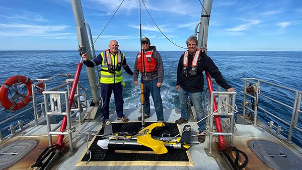 mind technology team on deck with a side scan sonar